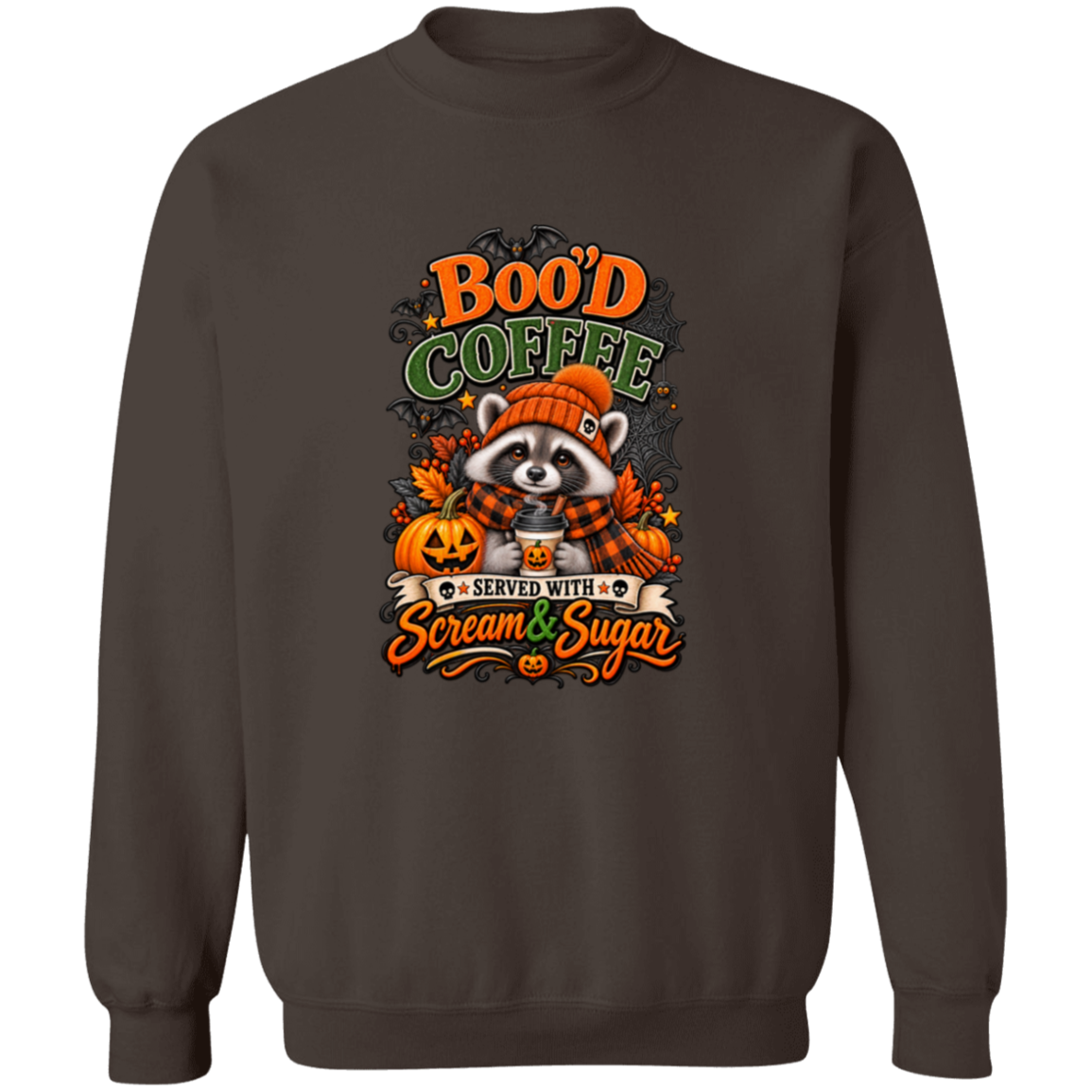 Dark Chocolate Sweatshirt featuring a Halloween raccoon wearing an orange knit hat and black-and-orange plaid scarf while holding a steaming pumpkin coffee, surrounded by pumpkins, autumn leaves, bats, spiderwebs, and berries, with bold text reading “Boo'd Coffee” and “Served With Scream & Sugar” on a transparent background