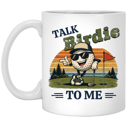 11 oz white mug on a transparent background featuring a cool cartoon golf ball rocking sunglasses on the green  leaning on a golf club and next to a putting hole with a flag inside of the hole with  a retro sunset background