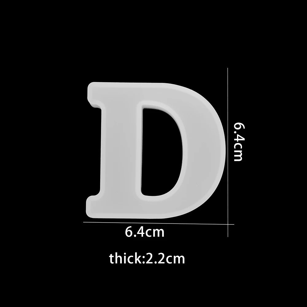 White letter 'D' with measurements on a black background 6.4 wide, 6.4 high 2.2cm thick
