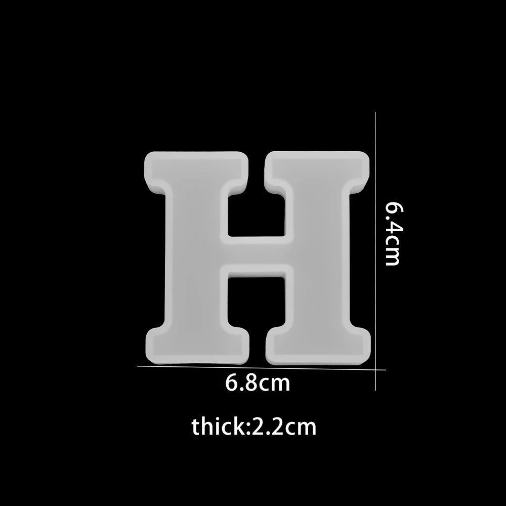 White letter 'H' with dimensions on a black background 6.8cm wide, 6.4cm high, 2.2cm thick