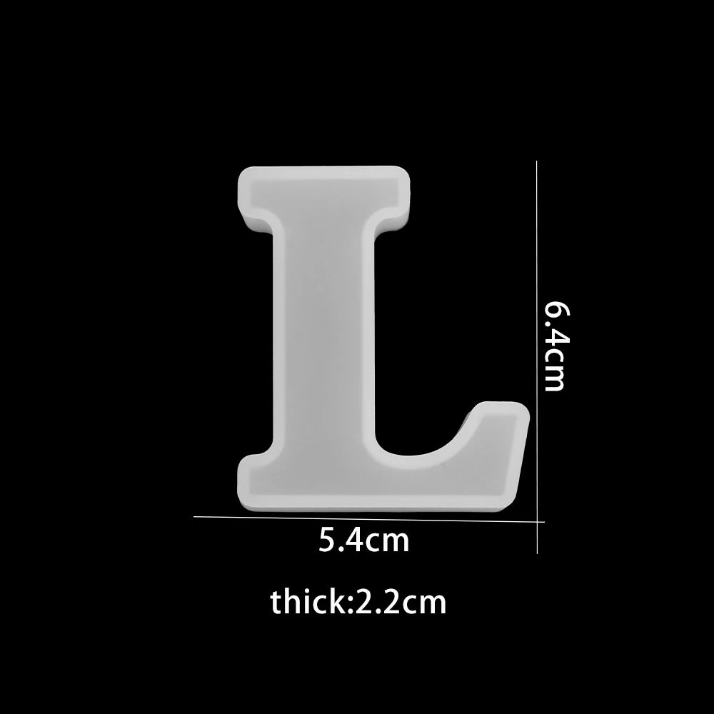White letter 'L' with measurements on a black background 5.4cm wide, 6.4cm high, 2.2cm thick