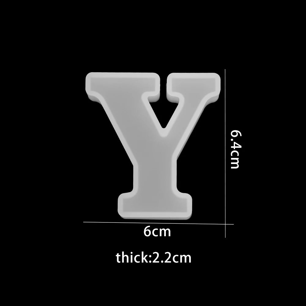 White letter 'Y' with measurements on a black background 6cm wide, 6.4cm high, 2.2cm thick