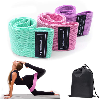 Three colorful fabric resistance loop bands displayed with resistance levels, dimensions, and recommended fitness levels for beginner to advanced workouts with a woman in a yoga pose with a pink band around her legs and a black bag which would hold the bands set on a white background