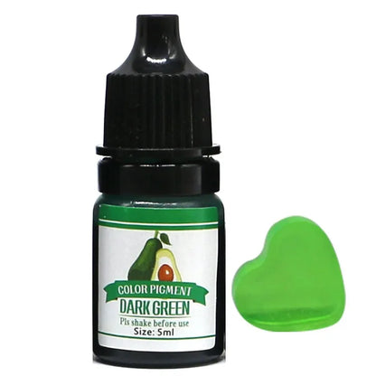 Bottle of dark green color pigment with a green heart-shaped sample on a white background