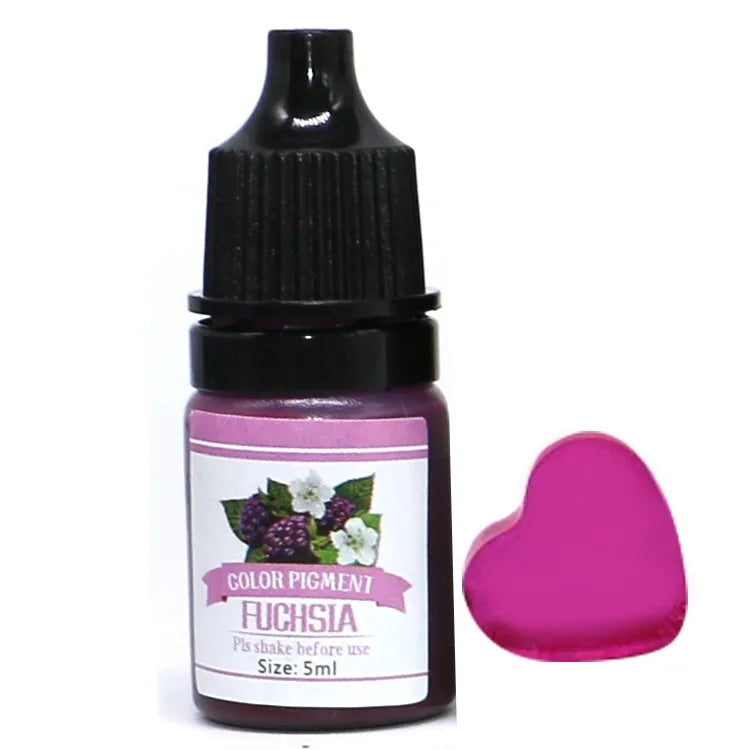Bottle of fuchsia color pigment with a heart-shaped applicator on a white background