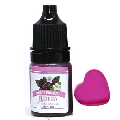 Bottle of fuchsia color pigment with a heart-shaped applicator on a white background