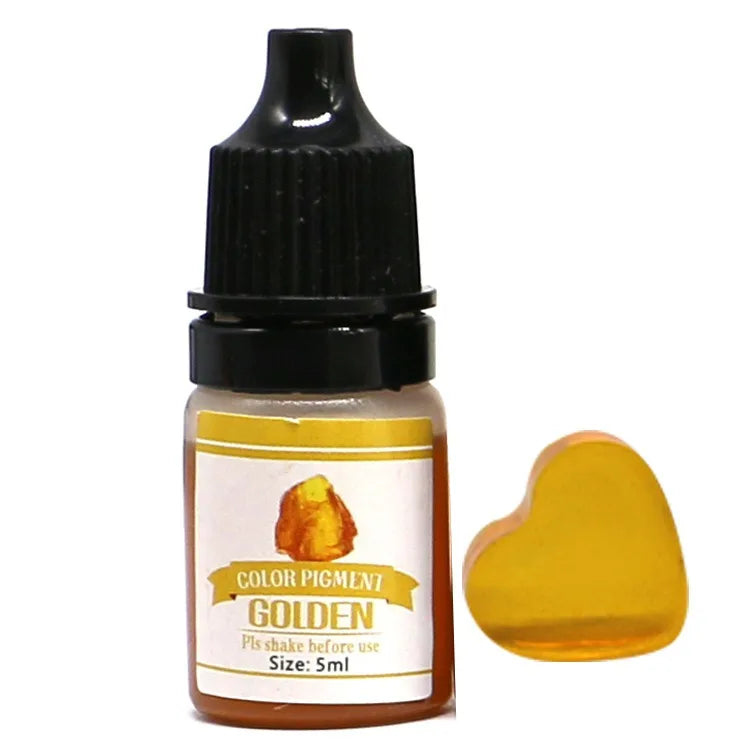 Bottle of color pigment labeled 'Golden' with a heart-shaped sample on a white background