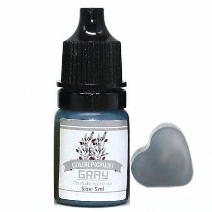 Bottle of gray color pigment with a swatch on a white background