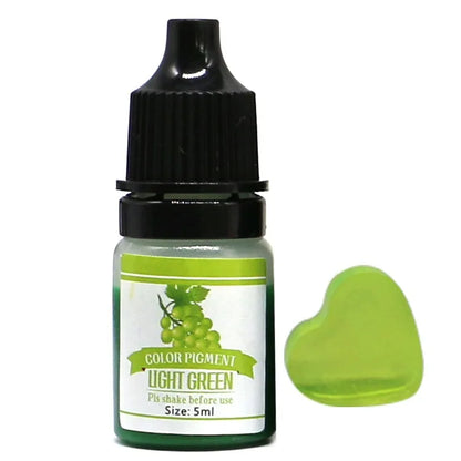 Bottle of light green color pigment with a sample swatch on a white background