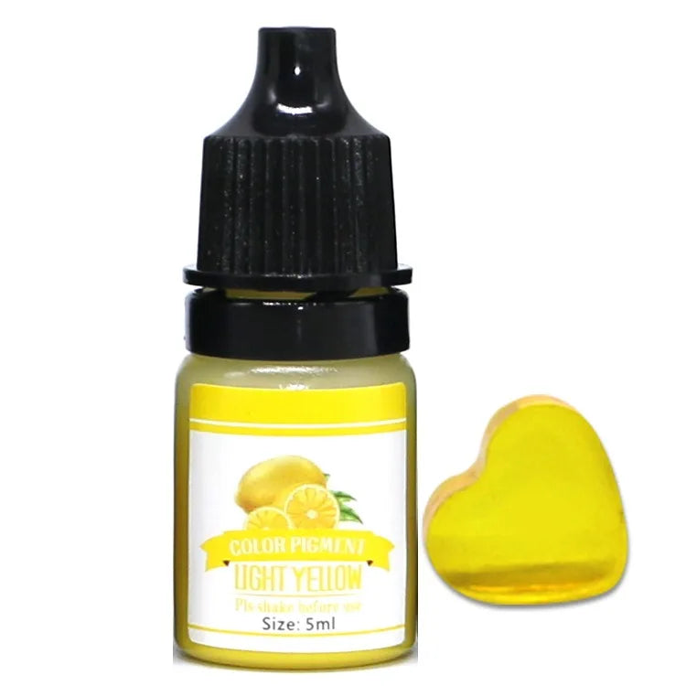 Bottle of light yellow color paint with a heart-shaped sample on a white background