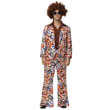 Man wearing a colorful 1970s-themed suit and wig with a white background