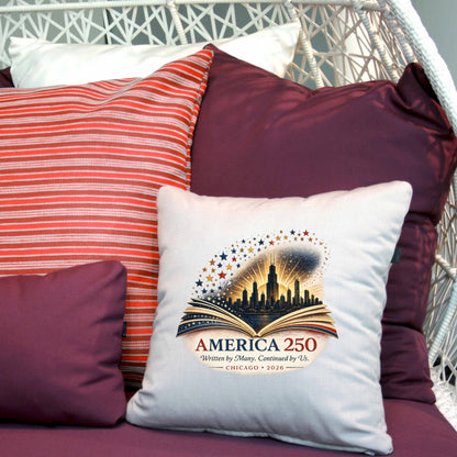 Decorative pillow with 'America 250' design on a chair with other pillows.