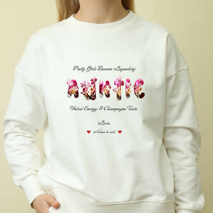 Person wearing a white long sleeve shirt Red long sleeve shirt featuring vibrant flowers, elegant botanical accents, and stylish typography with text and graphics on a beige background