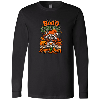 Black Long Sleeve Shirt featuring a Halloween raccoon wearing an orange knit hat and black-and-orange plaid scarf while holding a steaming pumpkin coffee, surrounded by pumpkins, autumn leaves, bats, spiderwebs, and berries, with bold text reading “Boo'd Coffee” and “Served With Scream & Sugar” on a transparent background