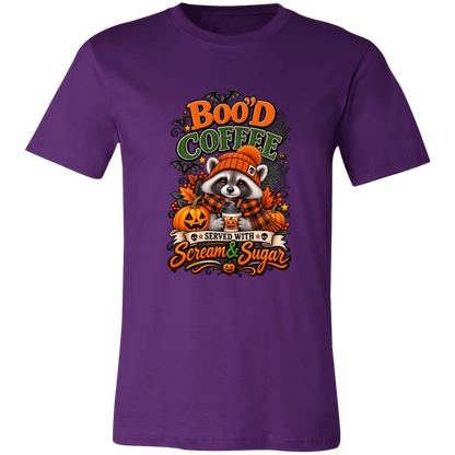 Purple Unisex T-Shirt featuring a Halloween raccoon wearing an orange knit hat and black-and-orange plaid scarf while holding a steaming pumpkin coffee, surrounded by pumpkins, autumn leaves, bats, spiderwebs, and berries, with bold text reading “Boo'd Coffee” and “Served With Scream & Sugar” on a transparent background