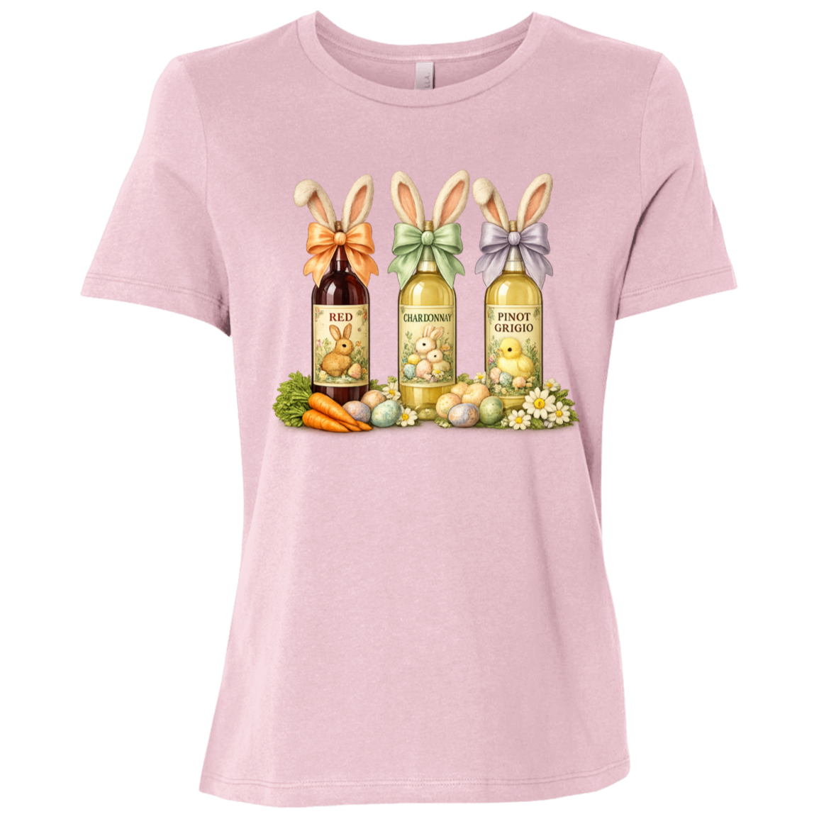 Image of a Pink t-shirt with a colorful graphic design of three wine bottles (Red, Chardonnay, Pinot Grigio) with bows around the neck of the bottle and bunny ears posed in different positions at the top, flowers, a bunch of carrots and easter designed eggs are at the bottom surrounding the bottoms.
