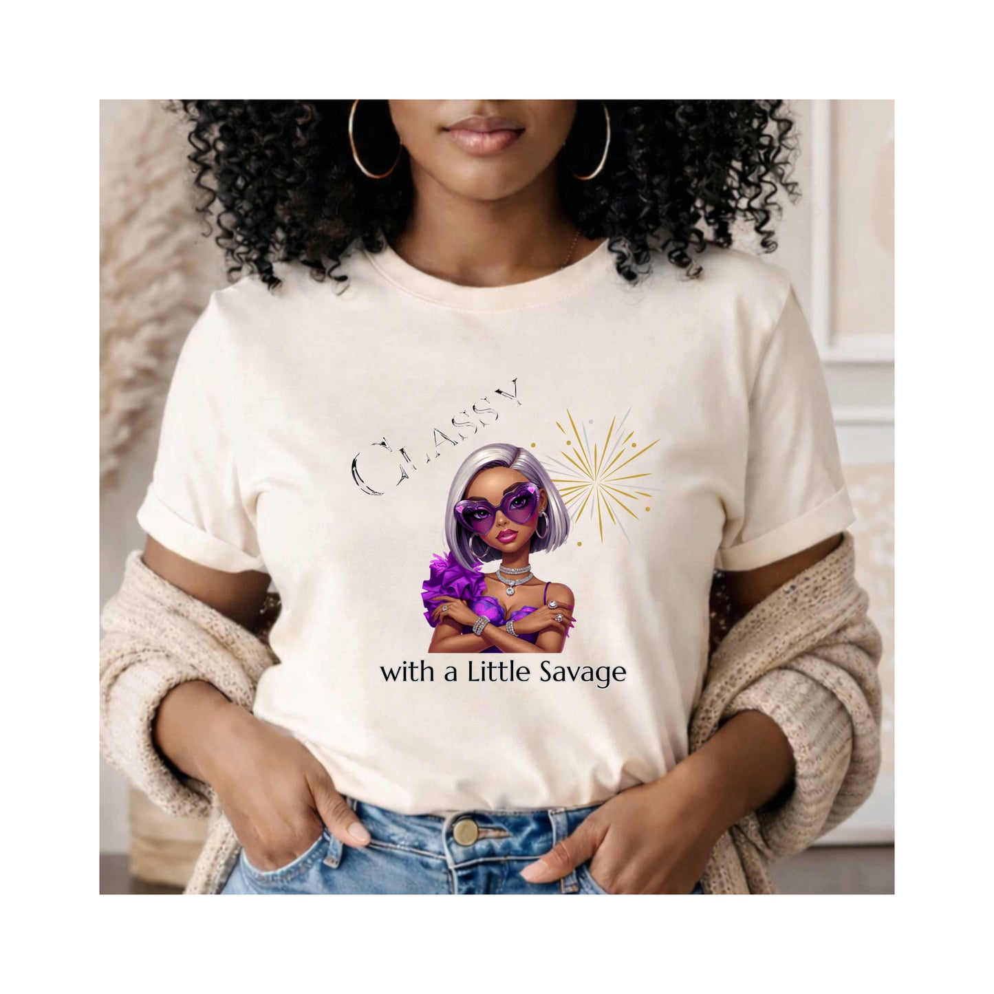 Woman wearing a white t-shirt featuring a stylish fashion-forward diva dressed in vibrant purple, oversized statement sunglasses, sparkling jewelry, and unapologetic confidence
