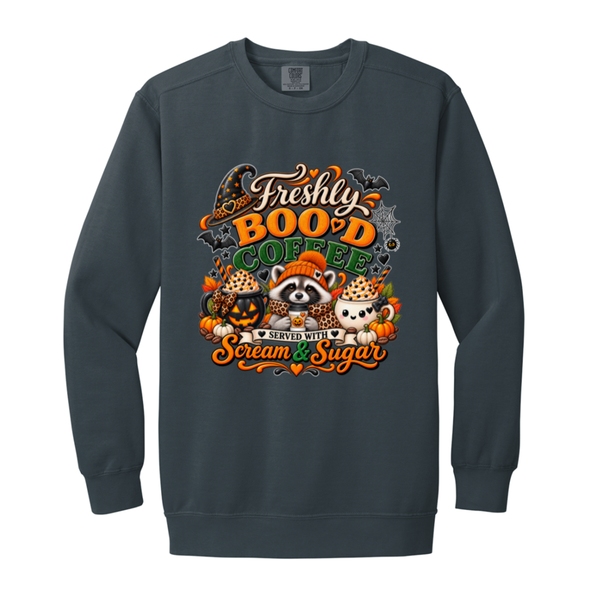 Denim Halloween coffee design sweatshirt featuring a cozy raccoon in an orange knit hat and scarf surrounded by pumpkin spice drinks, pumpkins, bats, and autumn leaves, with the text “Freshly Boo'd Coffee” and “Scream & Sugar” on a transparent background