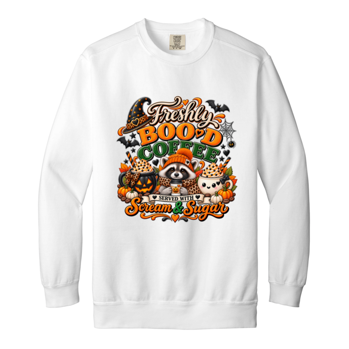 White Halloween coffee design sweatshirt featuring a cozy raccoon in an orange knit hat and scarf surrounded by pumpkin spice drinks, pumpkins, bats, and autumn leaves, with the text “Freshly Boo'd Coffee” and “Scream & Sugar” on a transparent background