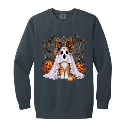 Glam Halloween Denim color sweatshirt cat design featuring an orange-and-white cat wearing an iridescent ghost costume with an ornate black-and-orange jeweled bow, surrounded by decorated jack-o'-lanterns, bats, spiderwebs, stars, and gothic Halloween embellishments on a transparent background.