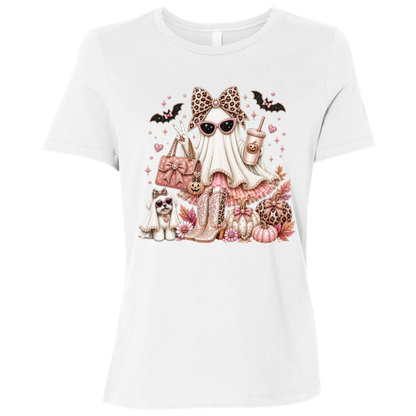 White graphic T-shirt with a Halloween illustration of a Glamorous pearl-white ghost fashionista wearing sparkling sunglasses and a leopard-print bow with a dusty-rose handbag, embellished boots, rose-gold pumpkins, black bats, autumn leaves, and a small ghost dog companion on a transparent background