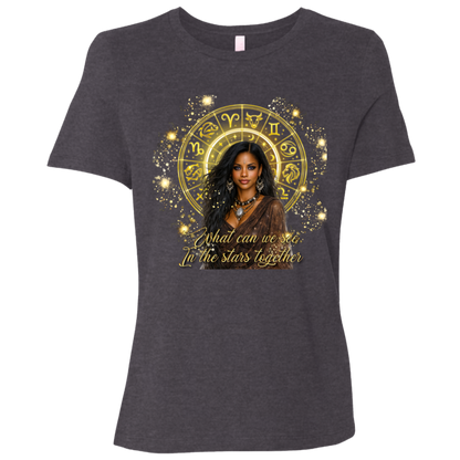 Dark Heather Grey celestial-inspired t-shirt featuring a radiant zodiac wheel, cosmic gold accents, and the enchanting phrase: 'What can we see in the stars together' standing in front of a colorful mural with different sayings.