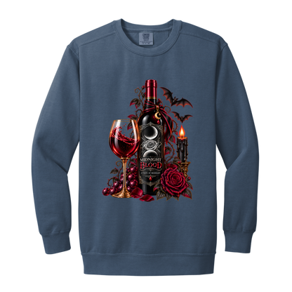 Blue Jean sweatshirt with a Gothic Halloween wine-inspired design featuring an ornate black bottle labeled “Midnight Blood,” a glass of red wine, crimson roses, dark vines, bats, a crescent moon, glowing black candle, and elegant black, red, gold, and silver details on a transparent background