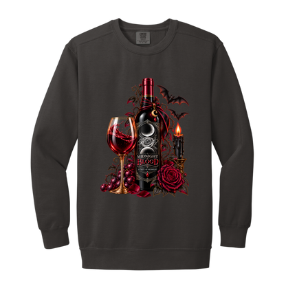 Pepper sweatshirt with a Gothic Halloween wine-inspired design featuring an ornate black bottle labeled “Midnight Blood,” a glass of red wine, crimson roses, dark vines, bats, a crescent moon, glowing black candle, and elegant black, red, gold, and silver details on a transparent background