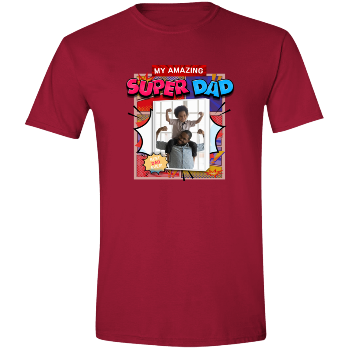 Cardinal Red t-shirt with 'My Amazing Super Dad' graphic design featuring vibrant superhero-inspired graphics, explosive comic panels, and a customizable photo area that has a father holding his son on his shoulders both showing their mussels on a transparent background