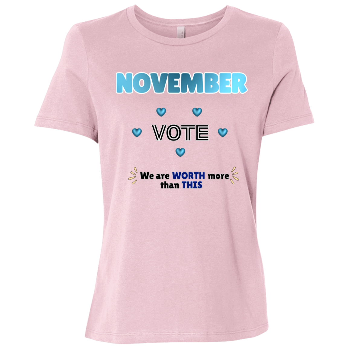Bold November voting design on a Pink T-Shirt featuring large blue gradient “NOVEMBER” lettering at the top, surrounded by blue heart accents. The center features outlined “VOTE” text, while the bottom reads “We are WORTH more than THIS,” with WORTH and THIS highlighted in blue and warm gold decorative accents on both sides. The design has a transparent background and high-contrast outlined typography set on a transparent background
