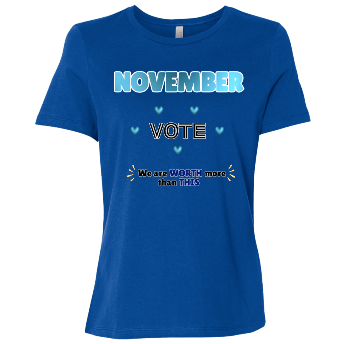 Bold November voting design on a True Royal T-Shirt featuring large blue gradient “NOVEMBER” lettering at the top, surrounded by blue heart accents. The center features outlined “VOTE” text, while the bottom reads “We are WORTH more than THIS,” with WORTH and THIS highlighted in blue and warm gold decorative accents on both sides. The design has a transparent background and high-contrast outlined typography set on a transparent background
