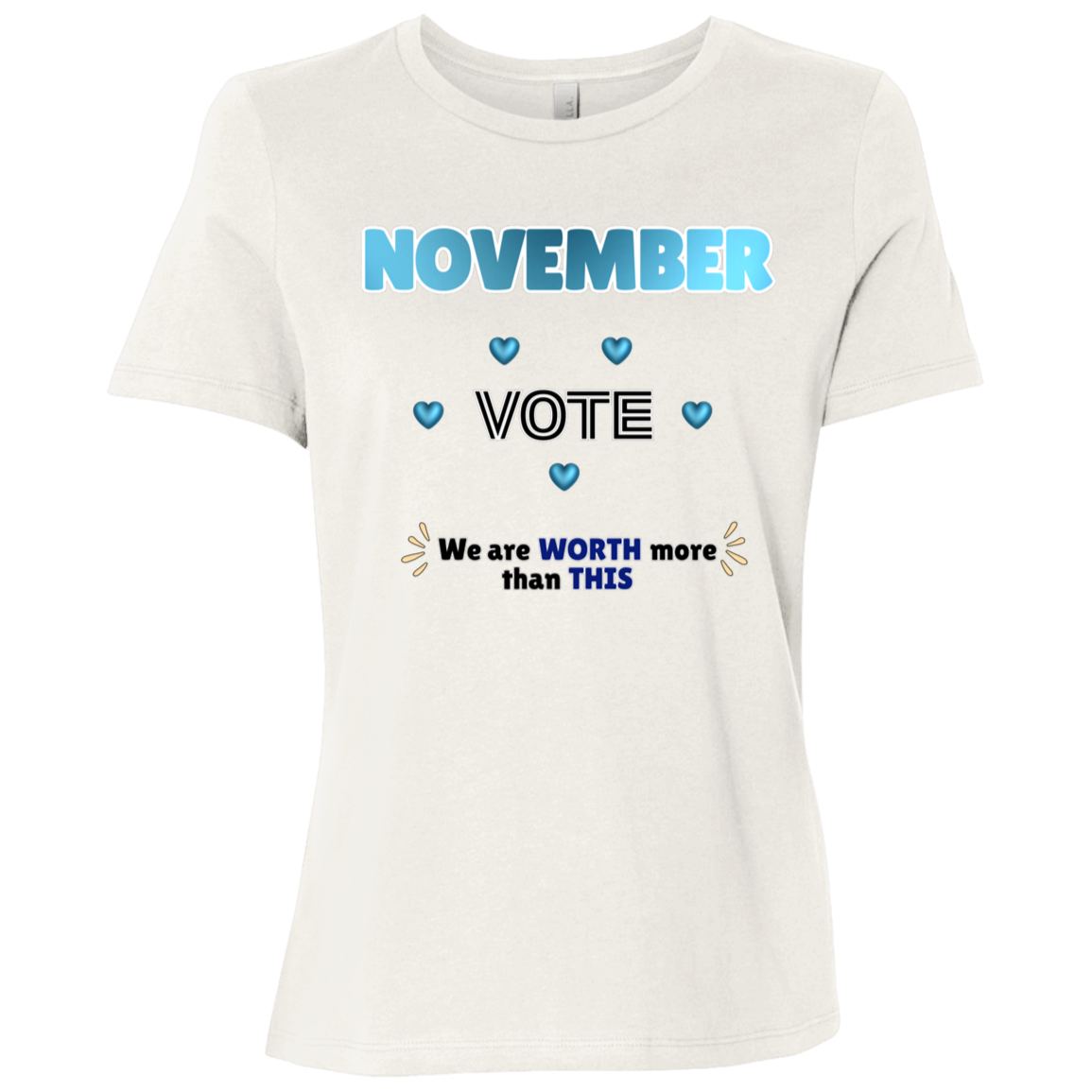 Bold November voting design on a Vintage White T-Shirt featuring large blue gradient “NOVEMBER” lettering at the top, surrounded by blue heart accents. The center features outlined “VOTE” text, while the bottom reads “We are WORTH more than THIS,” with WORTH and THIS highlighted in blue and warm gold decorative accents on both sides. The design has a transparent background and high-contrast outlined typography set on a transparent background