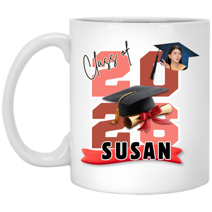 White mug featuring the graduate's name, custom photo, graduation year, and classic cap-and-diploma artwork with graduation design and '2026 Susan' design on a transparent background