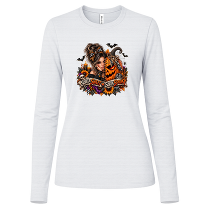 A White Long Sleeve Shirt featuring a woman in a glamorous Halloween scene surrounded by a decorated jack-o'-lantern, sunflowers, autumn flowers, candles, bats, skulls, and spiderwebs, with a decorative banner reading “Sorta Sweet Sorta Spooky” on a transparent background