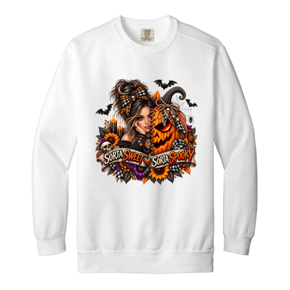 A White Sweatshirt featuring a woman in a glamorous Halloween scene surrounded by a decorated jack-o'-lantern, sunflowers, autumn flowers, candles, bats, skulls, and spiderwebs, with a decorative banner reading “Sorta Sweet Sorta Spooky” on a transparent background