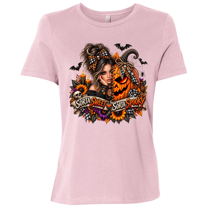 A Pink T-Shirt featuring a woman in a glamorous Halloween scene surrounded by a decorated jack-o'-lantern, sunflowers, autumn flowers, candles, bats, skulls, and spiderwebs, with a decorative banner reading “Sorta Sweet Sorta Spooky” on a transparent background