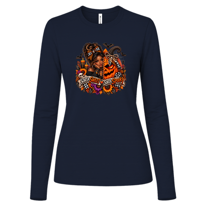 A Navy Long Sleeve Shirt featuring an African American woman in a glamorous Halloween scene surrounded by a decorated jack-o'-lantern, sunflowers, autumn flowers, candles, bats, skulls, and spiderwebs, with a decorative banner reading “Sorta Sweet Sorta Spooky” on a transparent background