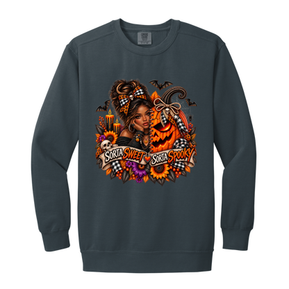 A Denim Sweatshirt featuring an African American woman in a glamorous Halloween scene surrounded by a decorated jack-o'-lantern, sunflowers, autumn flowers, candles, bats, skulls, and spiderwebs, with a decorative banner reading “Sorta Sweet Sorta Spooky” on a transparent background