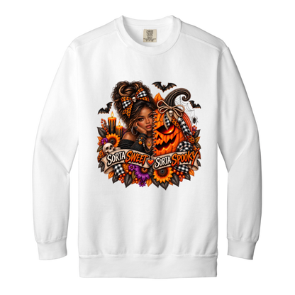 A White Sweatshirt featuring an African American woman in a glamorous Halloween scene surrounded by a decorated jack-o'-lantern, sunflowers, autumn flowers, candles, bats, skulls, and spiderwebs, with a decorative banner reading “Sorta Sweet Sorta Spooky” on a transparent background