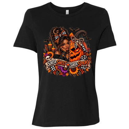 A Black T-Shirt featuring an African American woman in a glamorous Halloween scene surrounded by a decorated jack-o'-lantern, sunflowers, autumn flowers, candles, bats, skulls, and spiderwebs, with a decorative banner reading “Sorta Sweet Sorta Spooky” on a transparent background