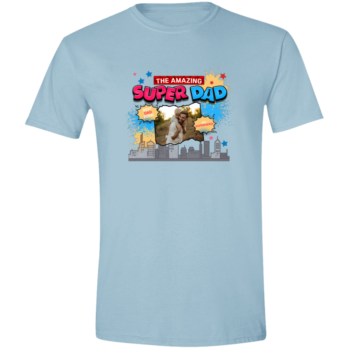 Light Blue t-shirt with 'The Amazing Super Dad' graphic and featuring eye-catching pop art elements, city skyline graphics, comic-style bursts, and a personalized photo placement of a man and child on a plain background