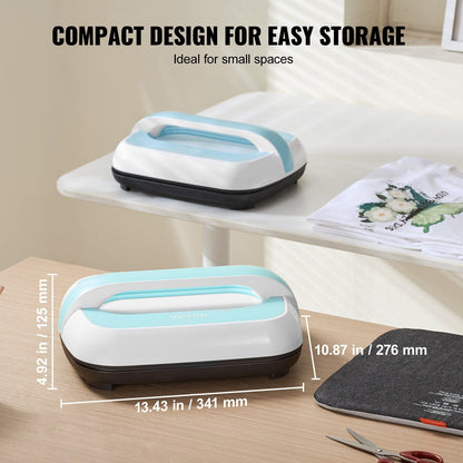 2 compact Vevor machines on on a white shelf with a stack of t-shirts and one on a wooden desk with dimensions 4.92 in x13.43 in x 10.87 in with scissors and a pad on the table