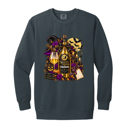 Denim sweatshirt with an elegant gothic Halloween design featuring an ornate golden bottle labeled “Witch's Gold,” surrounded by purple roses, black foliage, pumpkins, glowing candles, bats, spiderwebs, a witch hat, moon, and black-and-purple decorative ribbons on a transparent background